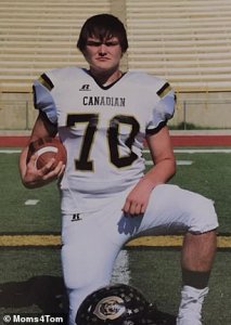 Tom Brown is pictured posing in his high school football uniform.